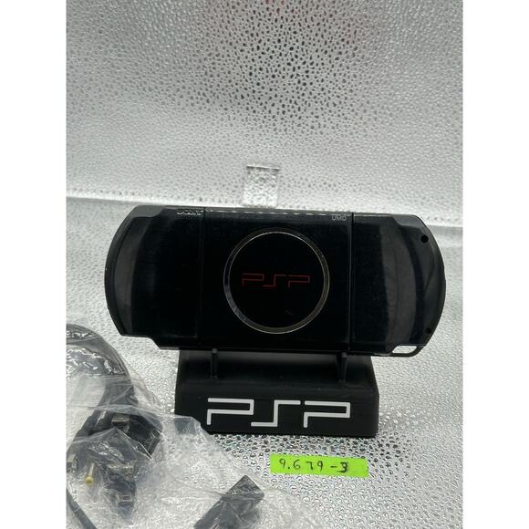 Red and black psp 3000 w/charger adapter, new battery & has glass screen lens - Picture 6 of 9